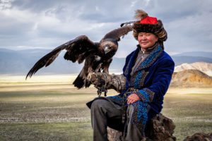 Eagle Hunter With His Eagle In Bayan Olgii, West Mongolia